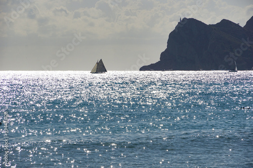 Beautiful sea landscape of Altea, Spain with sailboat and Ifach