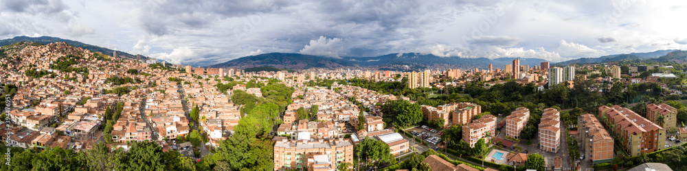 Aerial Panoramic View of Many Condominiums, High-Rise Buildings in the Mountains