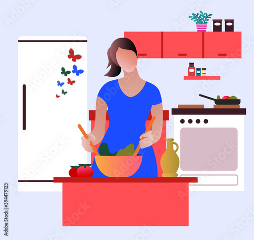 happy woman in kitchen making salad on blue background.
