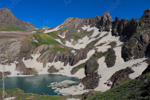 View of a lake in mountains. Hakkari cilo sat lakes, snowy mountains and natural scenery
 photo