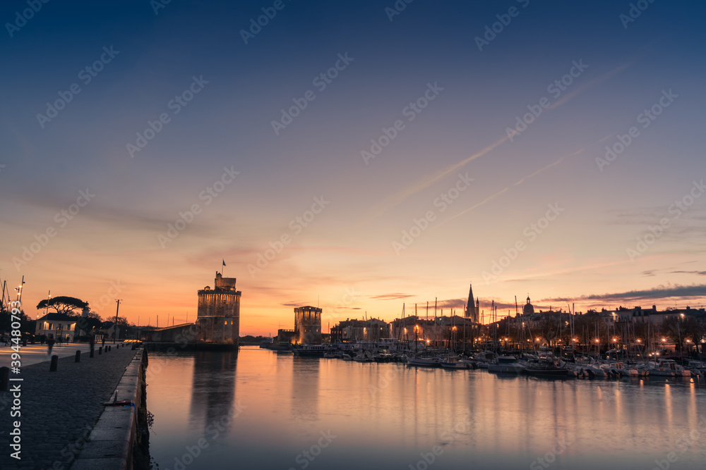 Panoramic view of the old harbor of La Rochelle at blue hour