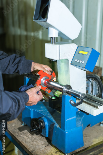 worker balancing cutting bit on machine