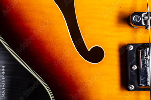 Sunburn semihollow vintage electric guitar close up still