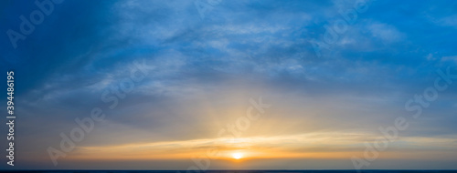 Dawn sky, sunbeams and dreams, morning panorama.