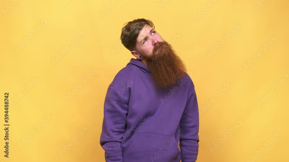 Young adult bearded caucasian man isolated confused, feels doubtful and unsure Young adult bearded caucasian man isolated confused, feels doubtful and unsure
