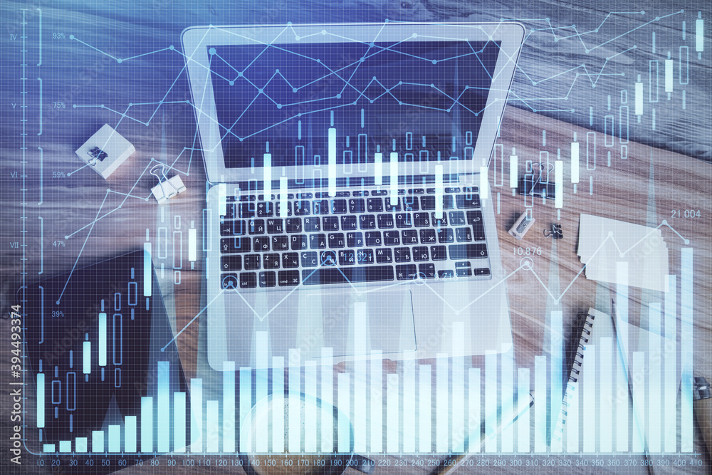 Double exposure of financial chart drawing over table background with computer. Concept of research and analysis. Top view. Double exposure of financial chart drawing over table background with computer. Concept of research and analysis. Top view.