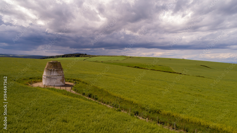 landscape with dovecot in a field on moray coast landscape with dovecot in a field on moray coast