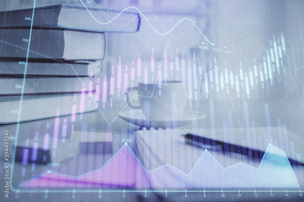 Double exposure of financial chart drawing and desktop with coffee and items on table background. Concept of forex market trading Double exposure of financial chart drawing and desktop with coffee and items on table background. Concept of forex market trading