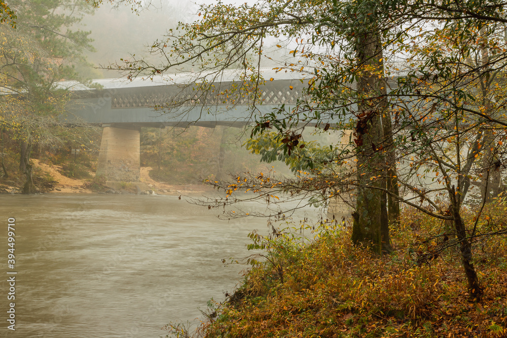 Swann Covered Bridge in Blount County Alabama in the Autumn fog