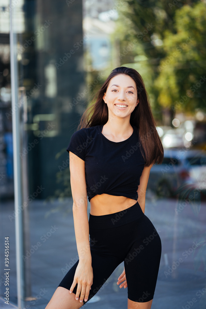 Beautiful woman, summer in city, fitness training on street. Beautiful woman, summer in city, fitness training on street.