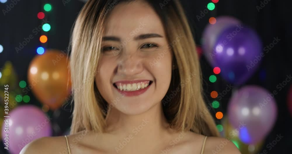 Portrait of beautiful asian woman at party event. She record video call to her friend with attractive smile. Portrait of beautiful asian woman at party event. She record video call to her friend with attractive smile.