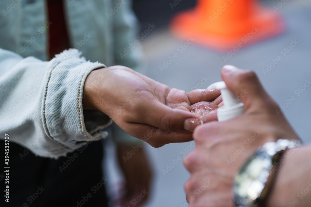 Fototapeta premium hand taking antibacterial gel