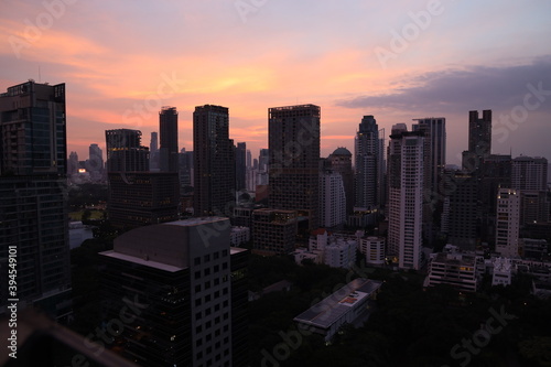 Red sky with wide view cityscape on rooftop bar