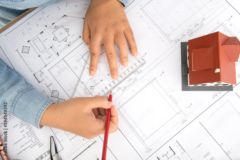 Architectural design practitioners are revising construction drawings Architectural design practitioners are revising construction drawings