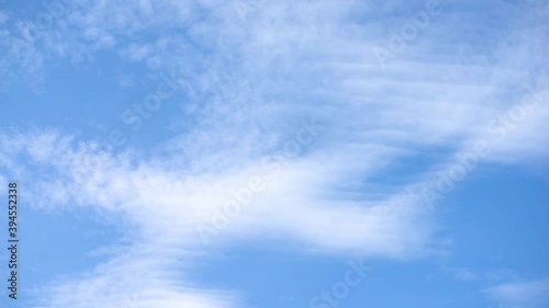 Timelapse rain clouds float in different directions