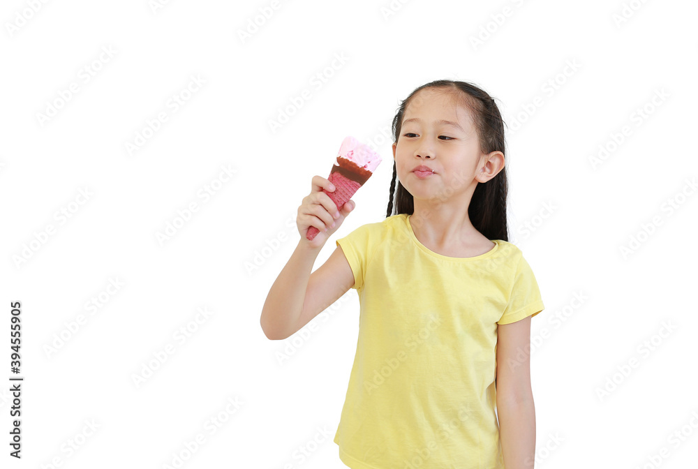 Portrait asian little child girl eating ice cream cone isolated on white background. Portrait asian little child girl eating ice cream cone isolated on white background.