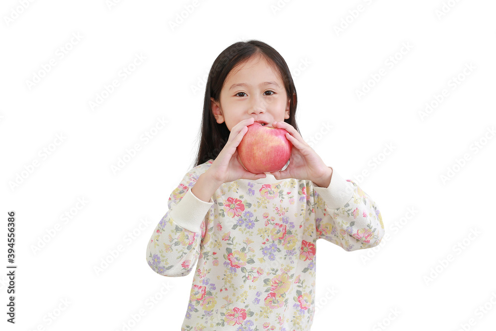 Smiling little asian girl holding red apple on white background Smiling little asian girl holding red apple on white background