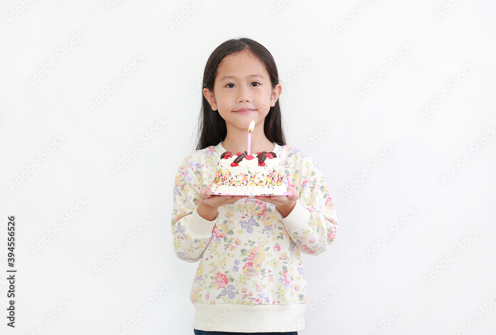 Portrait little asian kid girl holding happy birthday cake isolated on white background Portrait little asian kid girl holding happy birthday cake isolated on white background