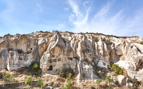 Ancient cave houses and rock formations near Goreme, Cappadocia, Turkey