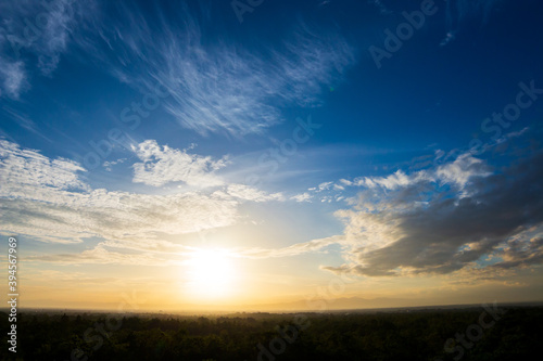 Natural Sunset Sunrise. Bright Dramatic Sky And Dark Ground. Countryside Landscape Under Scenic Colorful Sky © freedom_naruk