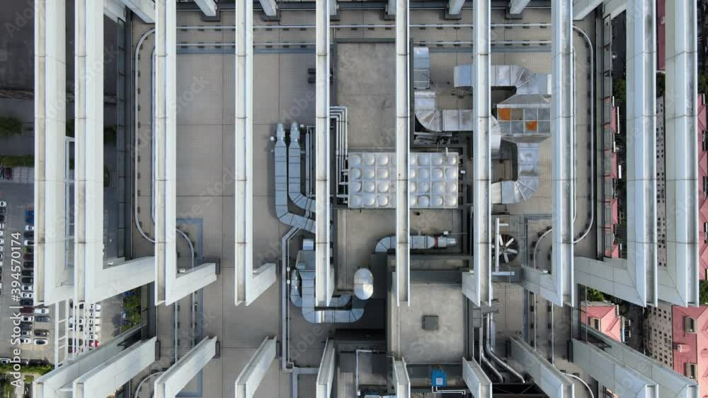 Drone aerial view of air conditioner system on roof deck in sunny day. Business economy, travel or industrial concept b-roll footage, drone aerial view in Shanghai China