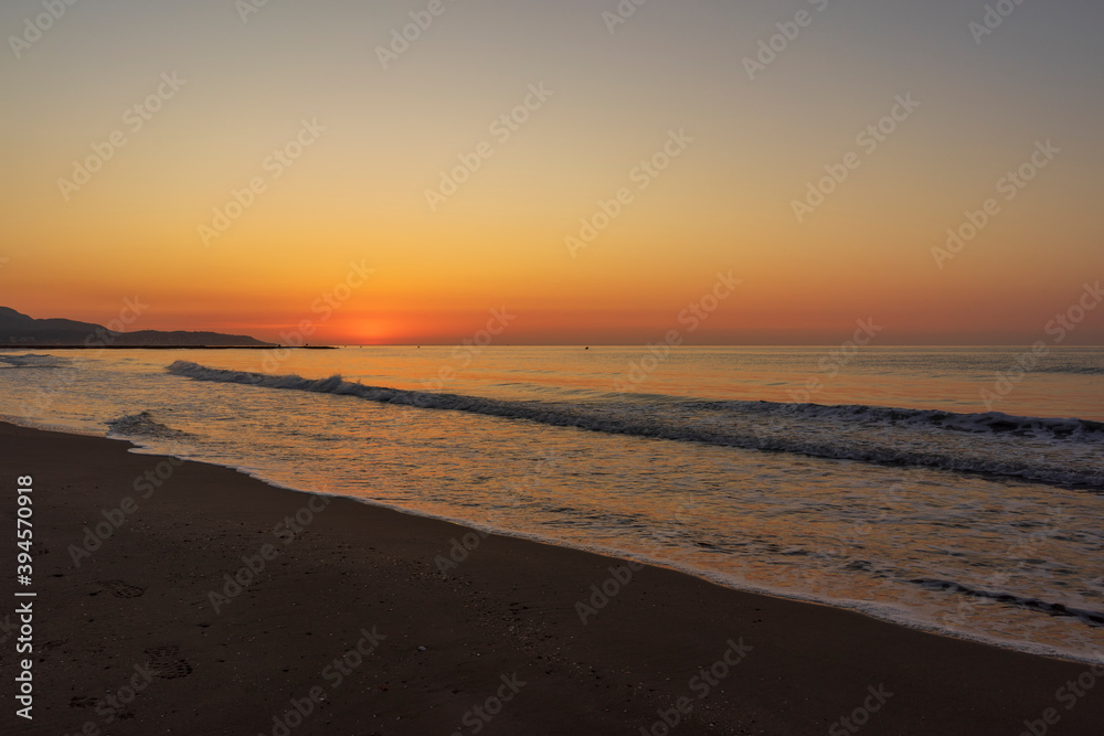 A peaceful sunrise on a beach on the Costa Azahar