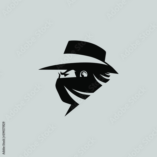 Cowboy masked outlaw side view portrait symbol on gray backdrop. Design element