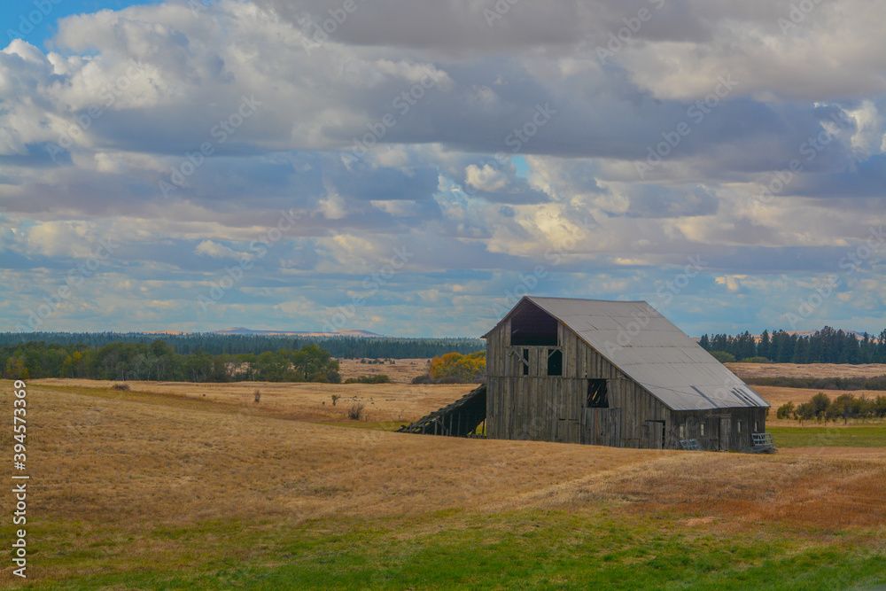 Empty old barn on farm land in Eastern Washington Empty old barn on farm land in Eastern Washington