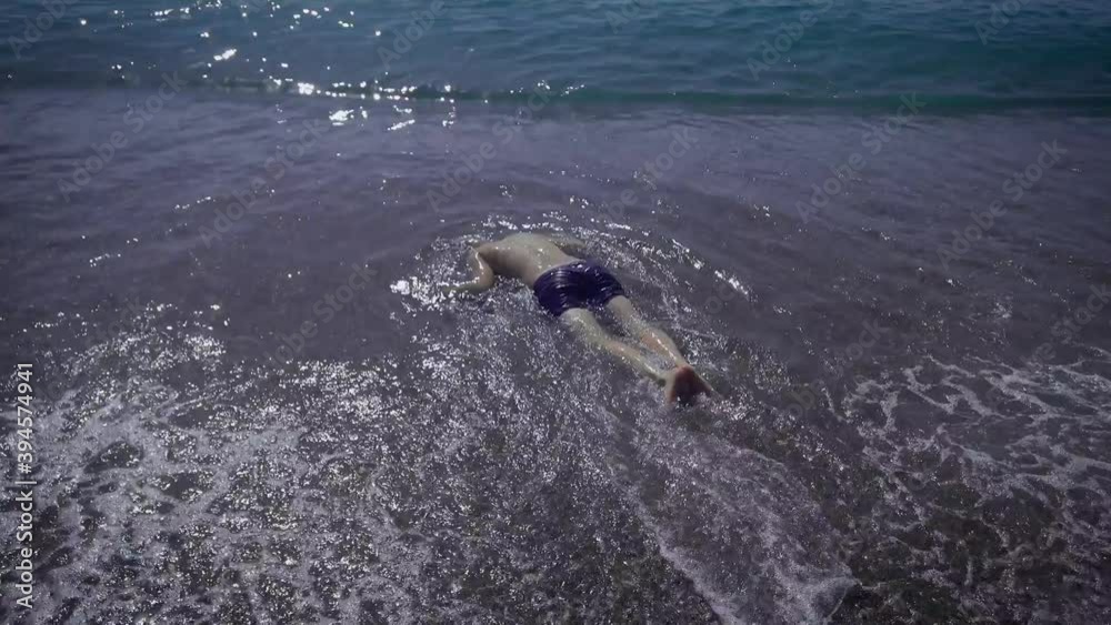 The body of an adult man who drowned at sea. Alcoholism on the water is ...