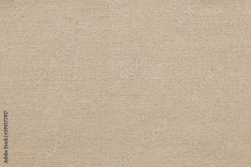 Brown cotton fabric texture background, seamless pattern of natural textile.