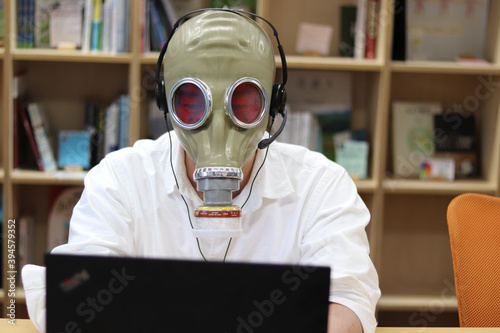 Extreme Social Distance, Gas mask at workplace, coworking space, remote work, covid, pandemic