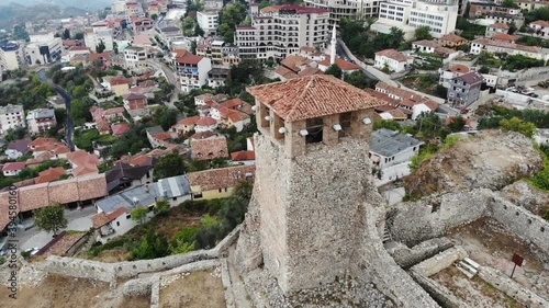 ancient historical ruins, old tower in the archelogical city, Kruje, Albania, arial shot from drone photo