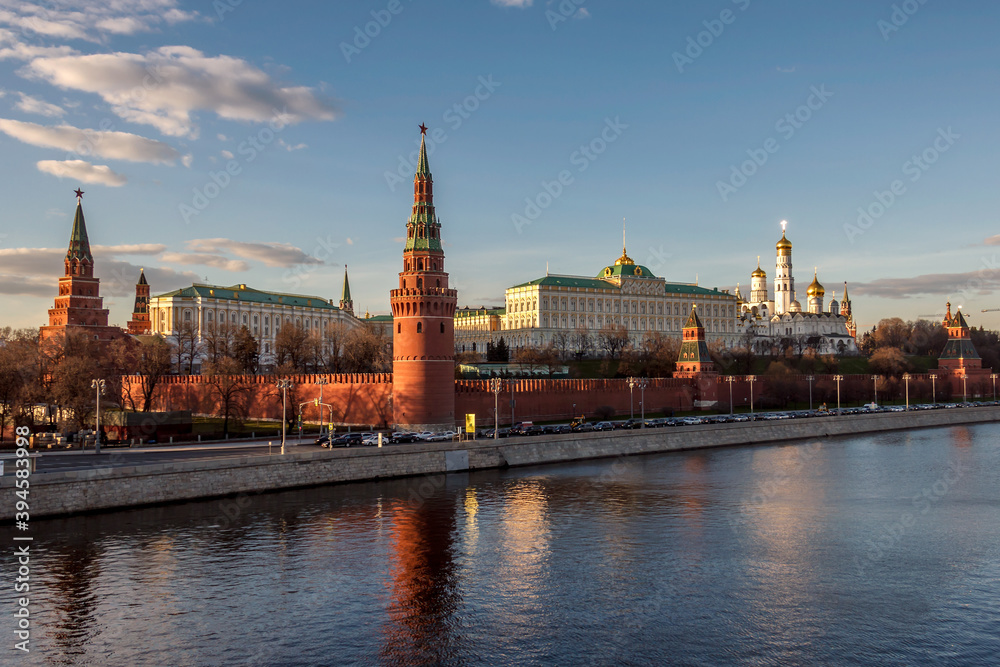 View of Moscow Kremlin Great Palaces and Churches from Moscow river at sunset