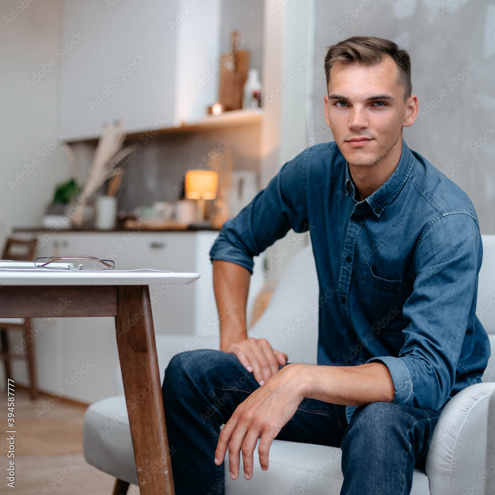 young man sitting in the home office. young man sitting in the home office.
