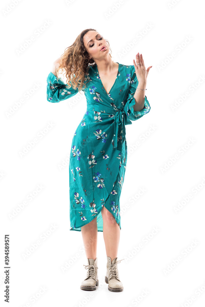 Beautiful young sweaty woman in dress feeling hot cooling by waving hand as fan. Full body isolated on white background. Beautiful young sweaty woman in dress feeling hot cooling by waving hand as fan. Full body isolated on white background.