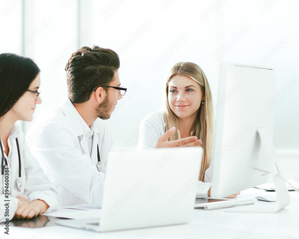 group of medical experts discussing online information. group of medical experts discussing online information.