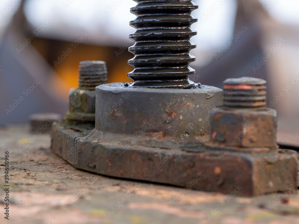Bolt thread close up. bolt in grease Bolt thread close up. bolt in grease