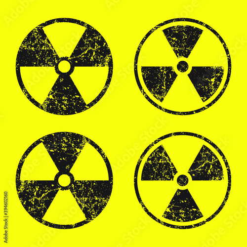 Radioactive symbol icon with grunge texture. Nuclear radiation warning sign. Atomic energy logo label. Vector illustration image.