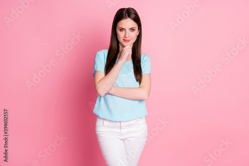 Photo of intelligent girl touch chin fingers think thoughts isolated over pink color background