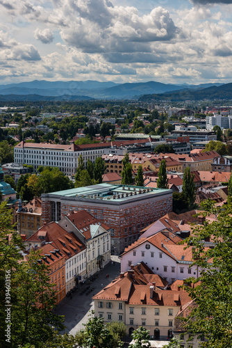 Scenic view from the Ljubljana Castle over the old city center on sunny day in late summer with clouds