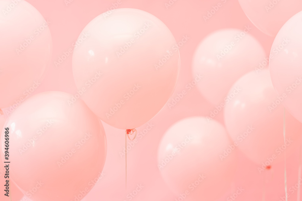 Pink balloons on a pink background