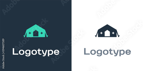 Logotype Military medical tent providing first aid to a patient icon isolated on white background. Medical tent free aid to people. Logo design template element. Vector.