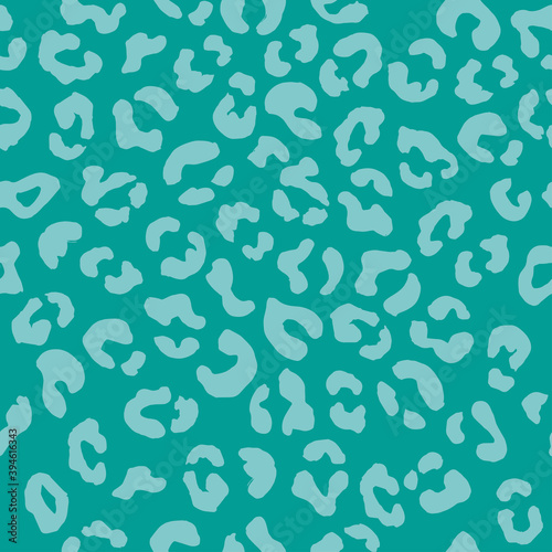 Leopard seamless pattern. Vector animal print. Light blue spots on a turquoise background. Jaguar  leopard  cheetah  panther fur. Leopard skin imitation can be painted on clothes  paper or fabric.
