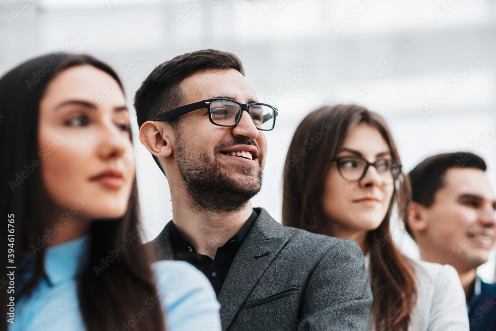 close up. young business woman standing with her colleagues