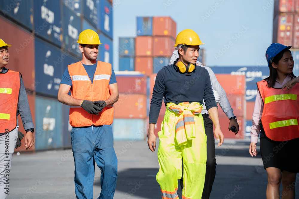 Team container worker .Logistics and transportation business Containers