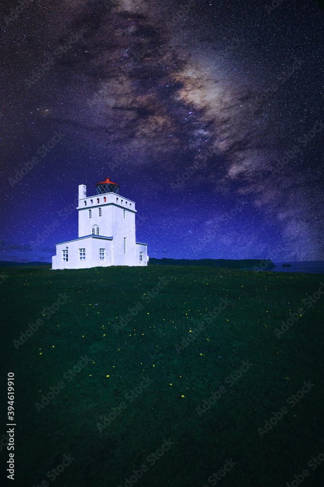 Iceland lighthouse with milky way