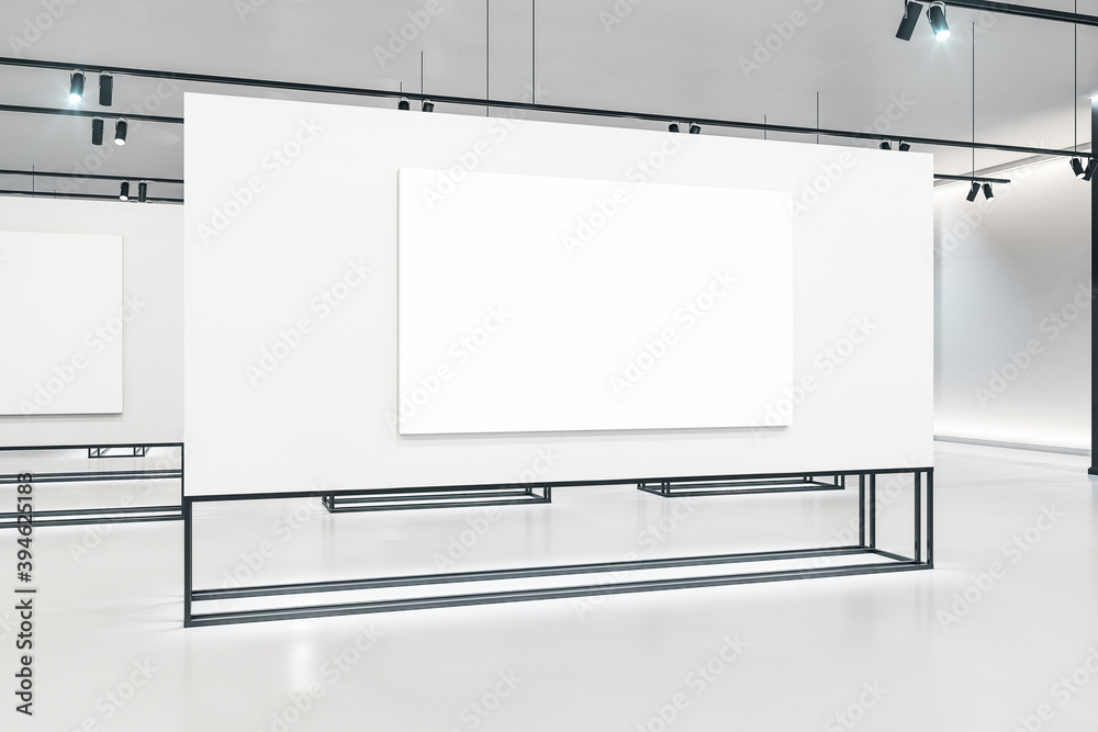Modern white gallery interior with empty poster.