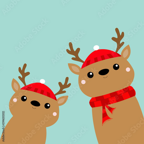 Two reindeer deer head face icon set. Cute cartoon kawaii baby character. Red hat, scarf, nose, horns. Merry Christmas. Happy New Year. Funny animal. Flat design. Hello winter. Blue background.