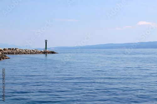 Clear sea and small lighthouse on the beach in Split, Croatia. © jelena990