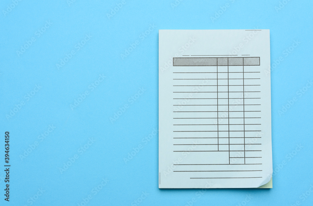 stack of blank blue blank checks insulated on a blue background stack of blank blue blank checks insulated on a blue background
